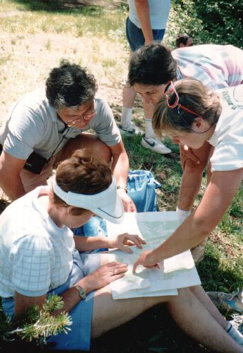 8643-NatureHikersMapReading.jpg 38.6K