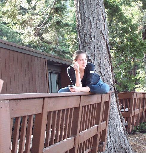 1024-JenniferHandsFreeYogaOnWillowFDeckRailing.jpg 72.8K