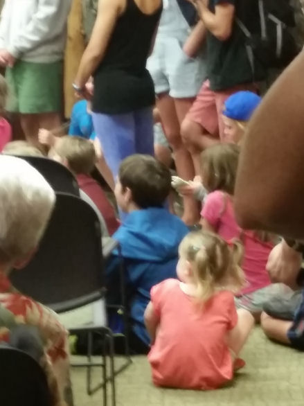 15-003-A-WatchingWelcomeSkits.jpg 56.5K